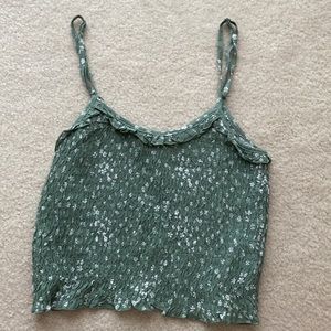 Women’s crop top in size Medium. Adjustable straps. Great condition.